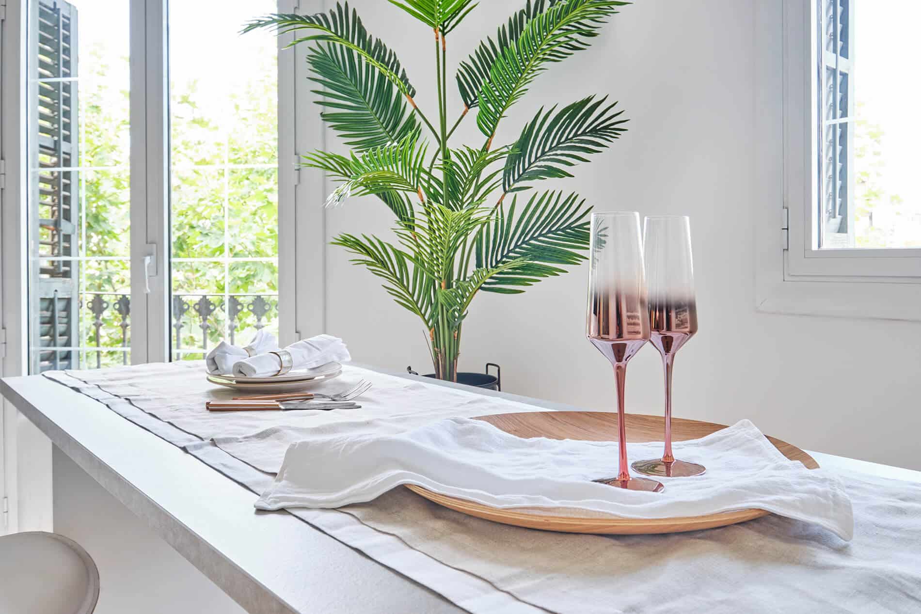 Barcelona roof studio - first floor, kitchen island with two wine glasses, designed by Beatrice Leupold Barcelona roof studio - first floor, kitchen island with two wine glasses, designed by Beatrice Leupold