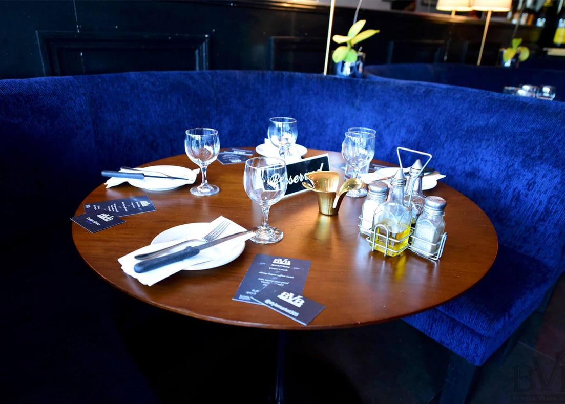 Buena Vista Bistro Restaurant - booth with a round table set, designed by Beatrice Leupold Buena Vista Bistro Restaurant - booth with a round table set, designed by Beatrice Leupold