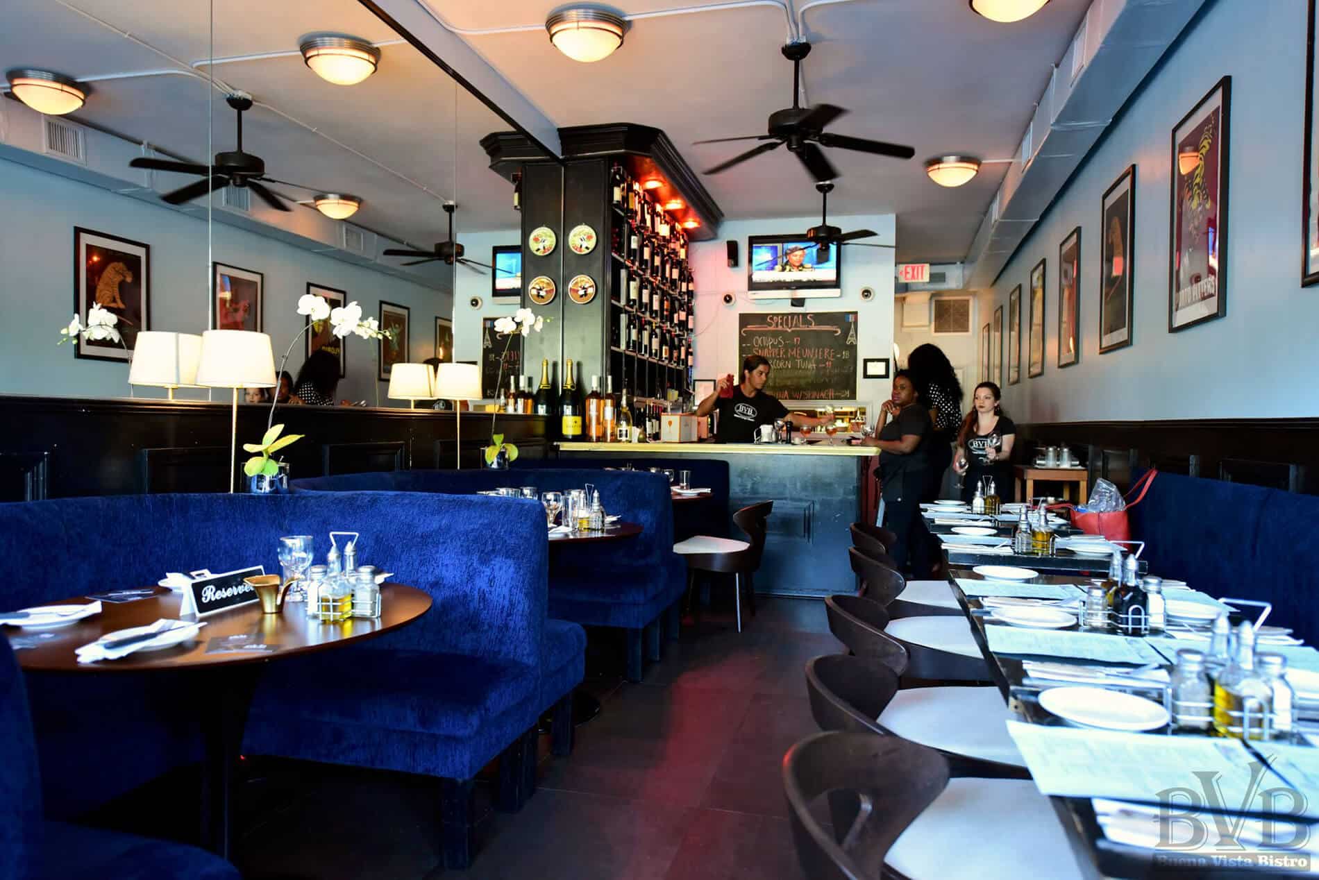 Buena Vista Bistro Restaurant - view of the interior transformation with blue booths on one side and tables on the other, designed by Beatrice Leupold Buena Vista Bistro Restaurant - view of the interior transformation with blue booths on one side and tables on the other, designed by Beatrice Leupold